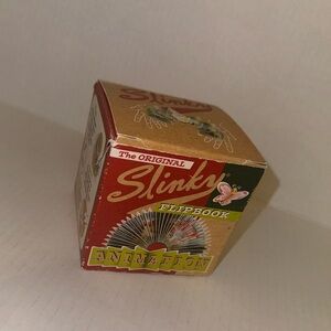 Vintage Slinky flip book in a box